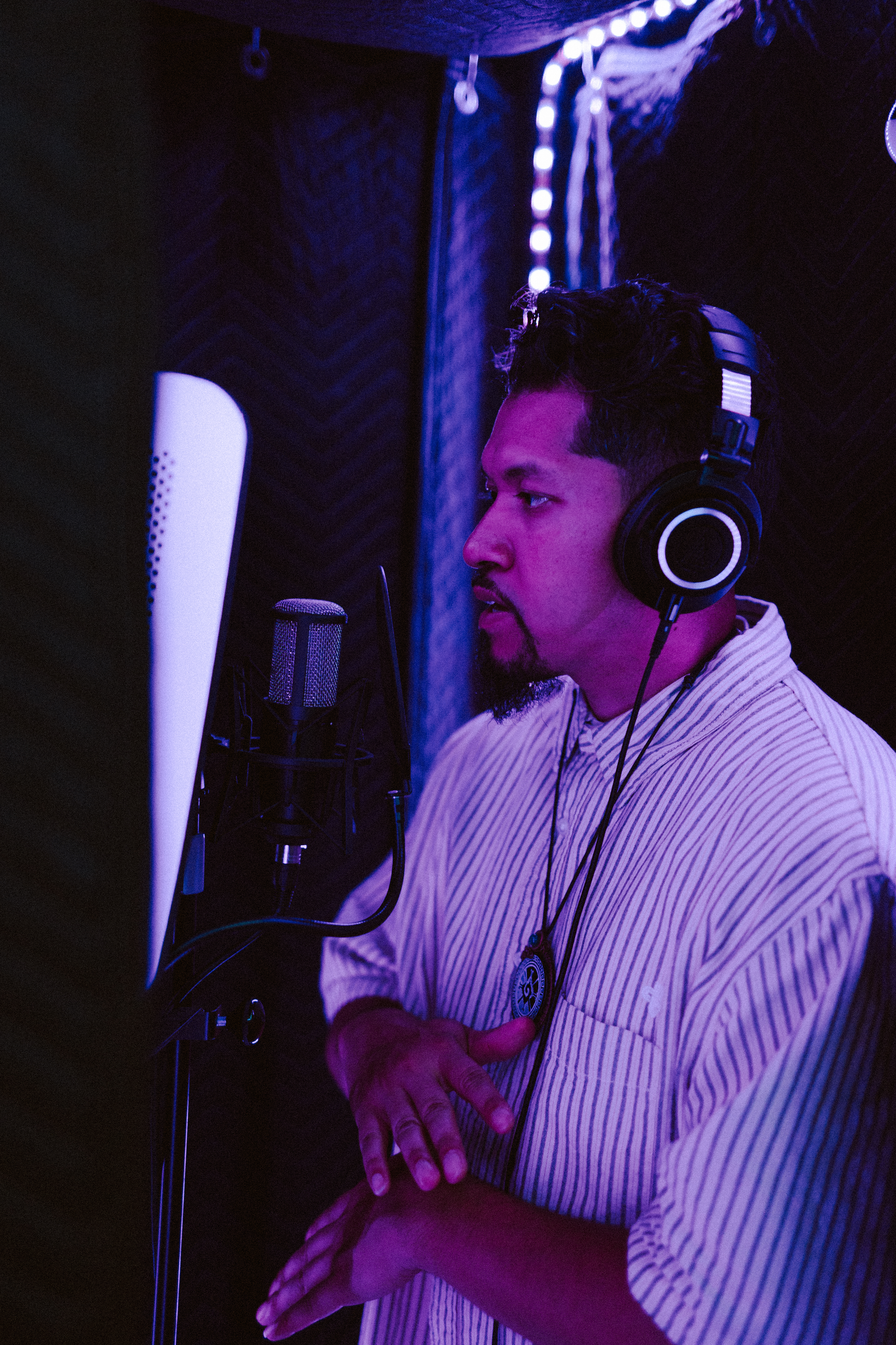 Artist recording vocals at Dojo Studios