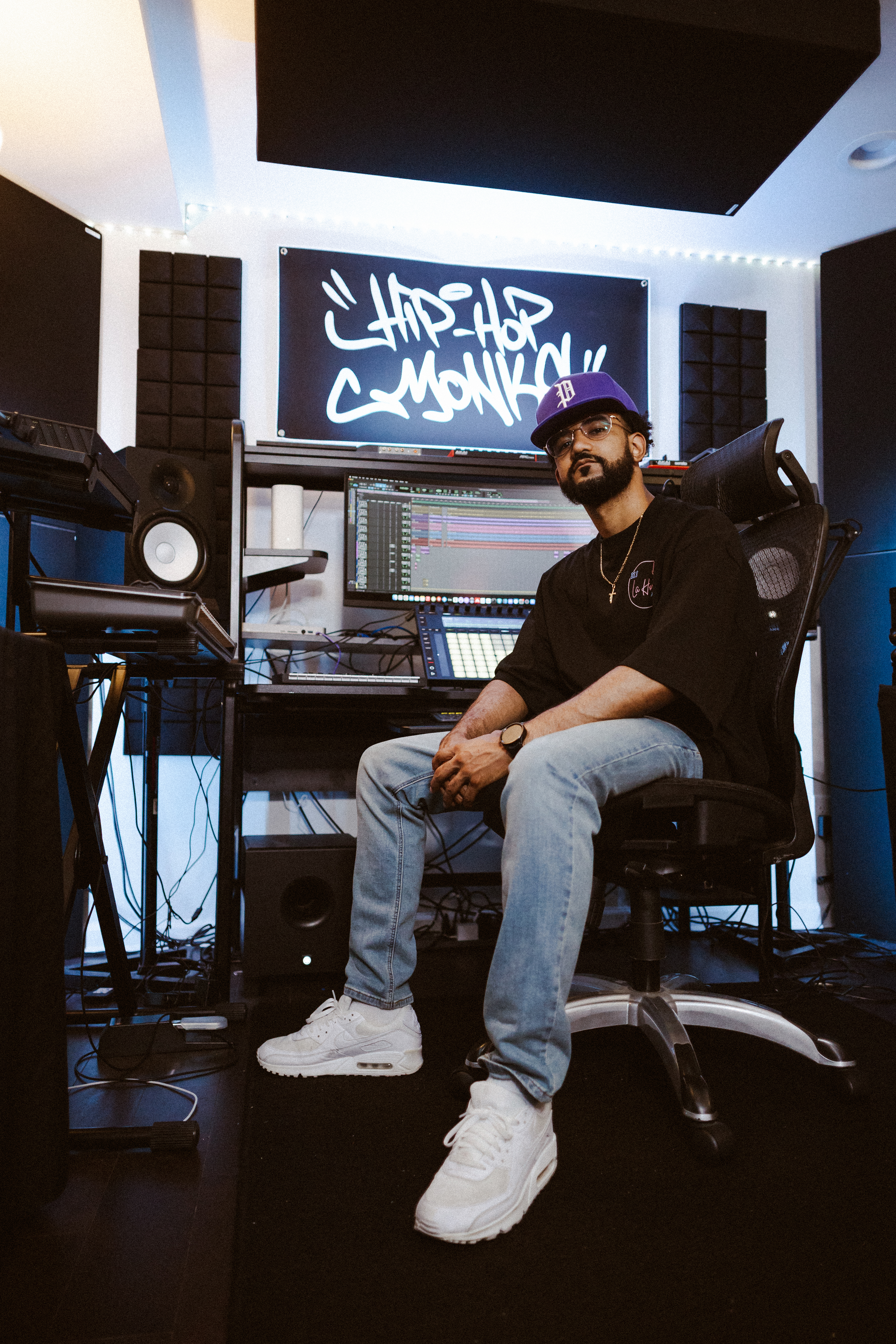 Dojo Studios owner and engineer seated in the control room