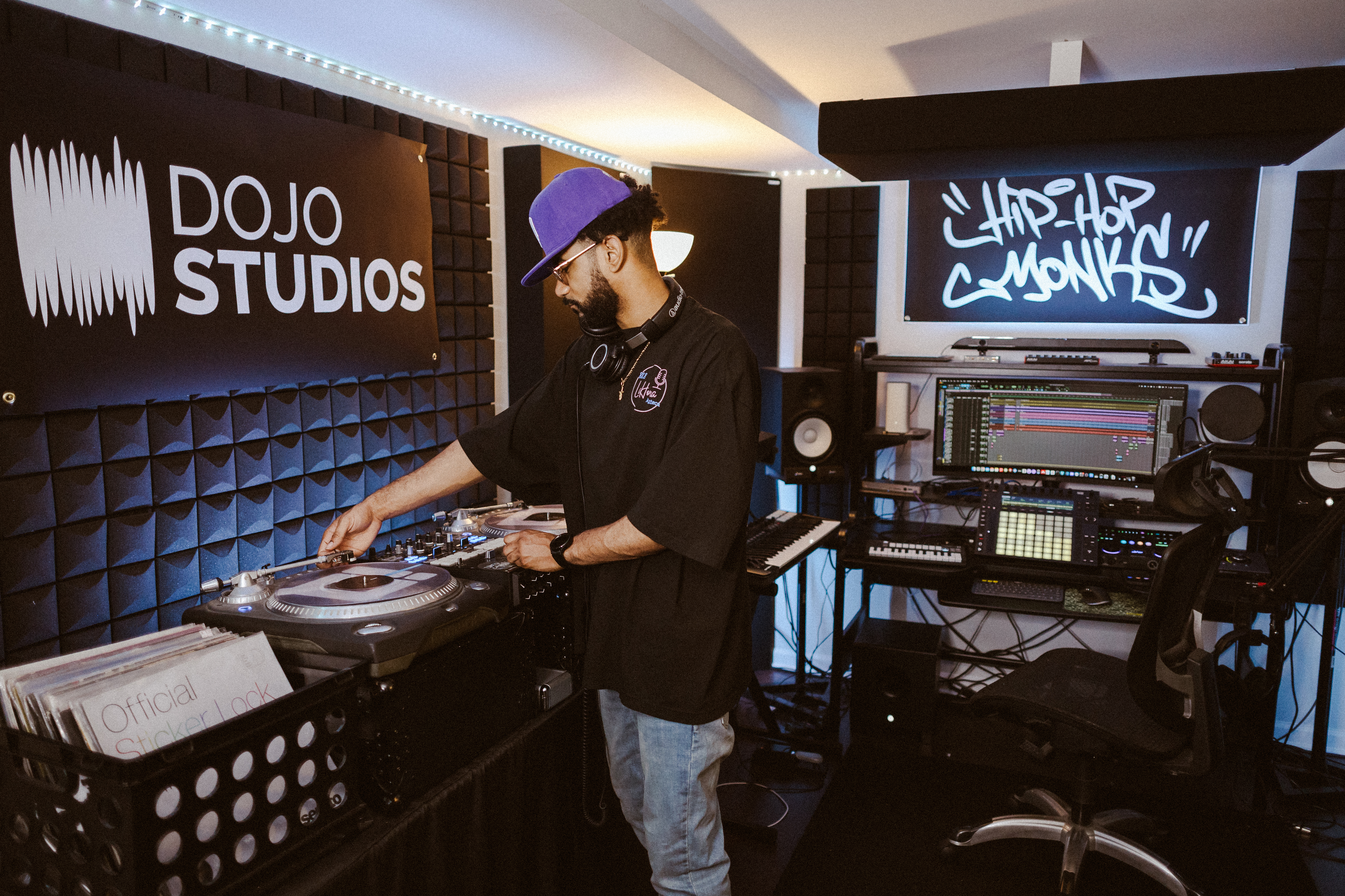 Dojo Studios owner working at the turntables in the studio
